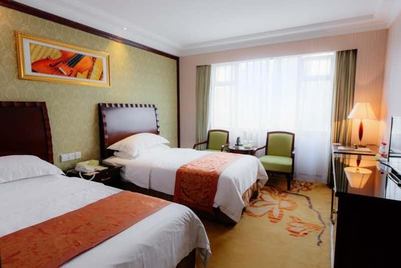 Vienna International Hotel Shanghai Train Station Room photo